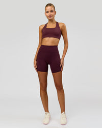 Woman wearing Aspire Sports Bra - Cherry Lacquer | Model:Taneisha | Size:XS | Thumbnail Index: 3