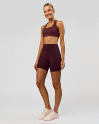 Woman wearing Aspire Sports Bra - Cherry Lacquer | Model:Taneisha | Size:XS | Thumbnail Index: 5