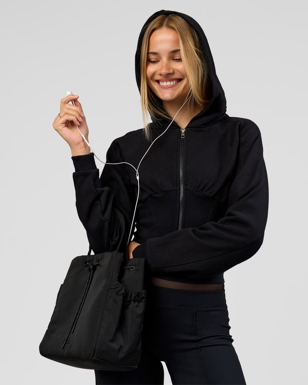 Woman wearing Bend Contour Silhouette Zip Through Hoodie - Black | Model:Taneisha | Size:XS - view 3