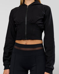 Woman wearing Bend Contour Silhouette Zip Through Hoodie - Black | Model:Taneisha | Size:XS | Thumbnail Index: 3