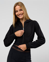 Woman wearing Bend Contour Silhouette Zip Through Hoodie - Black | Model:Taneisha | Size:XS | Thumbnail Index: 6