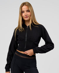 Woman wearing Bend Contour Silhouette Zip Through Hoodie - Black | Model:Taneisha | Size:XS | Thumbnail Index: 7