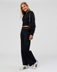 Woman wearing Bend Contour Silhouette Zip Through Hoodie - Black | Model:Taneisha | Size:XS | Thumbnail Index: 8