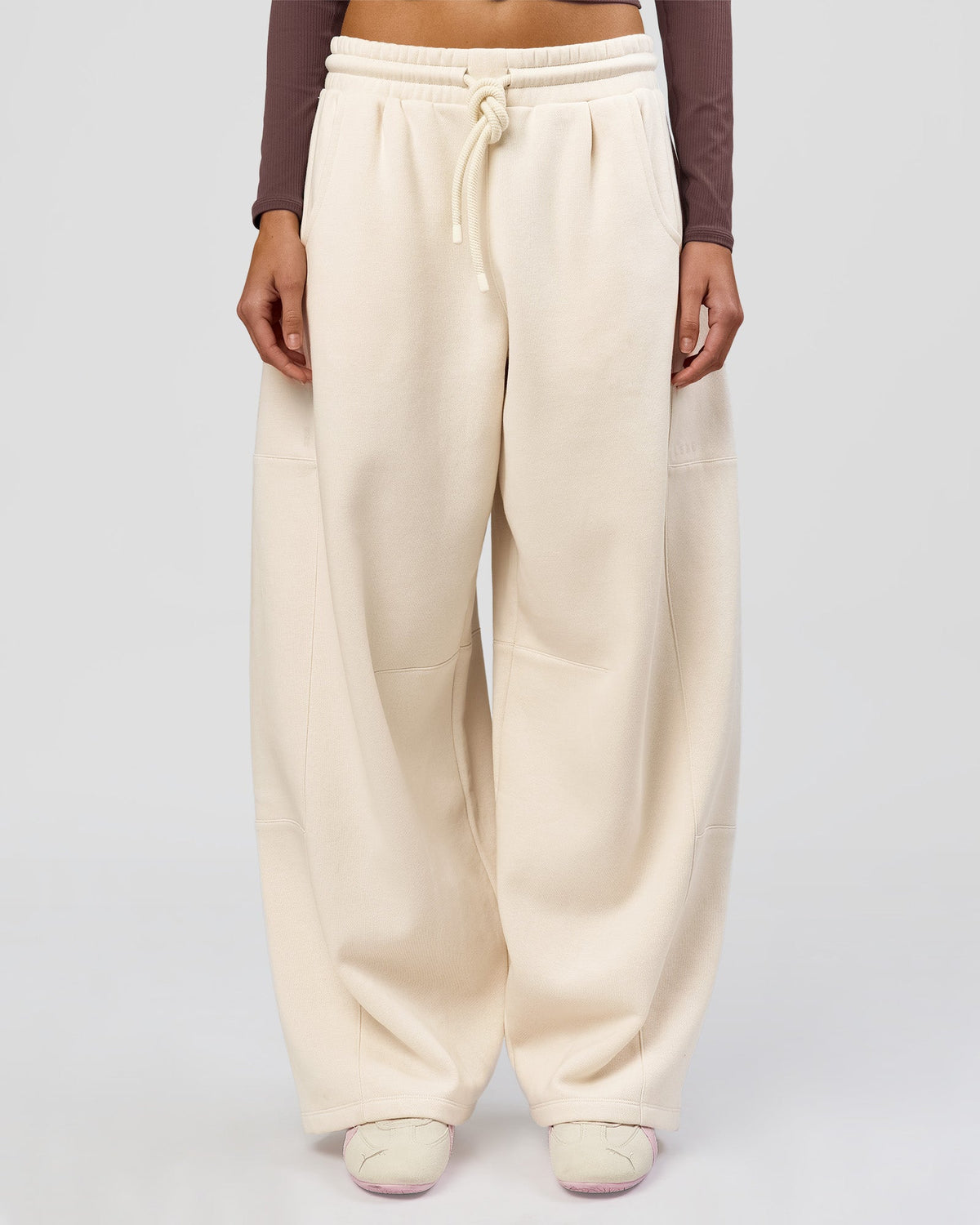 Woman wearing Bree Barrel Fleece Track Pant - Vanilla Bean | Model:Taneisha | Size:XS - view 2