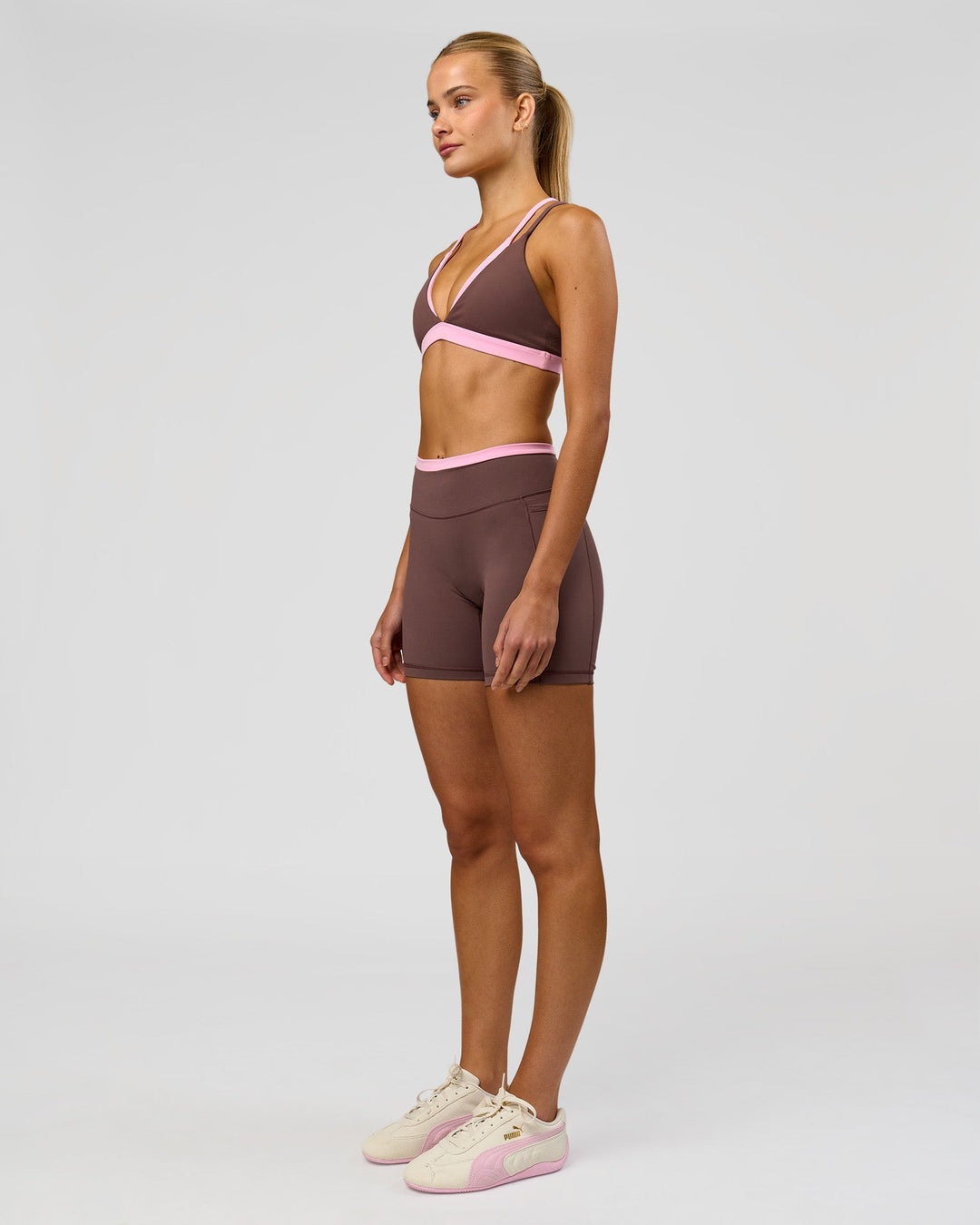 Woman wearing Bree Fusion High-Rise 6" Short Pockets - Cocoa Powder-Pink Rose | Model:Taneisha | Size:XS - view 7