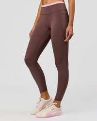 Woman wearing Bree Fusion High-Rise Full Length Legging Pockets - Cocoa Powder-Pink Rose | Model:Taneisha | Size:XS | Thumbnail Index: 0