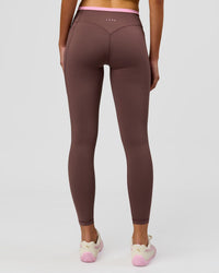 Woman wearing Bree Fusion High-Rise Full Length Legging Pockets - Cocoa Powder-Pink Rose | Model:Taneisha | Size:XS | Thumbnail Index: 1