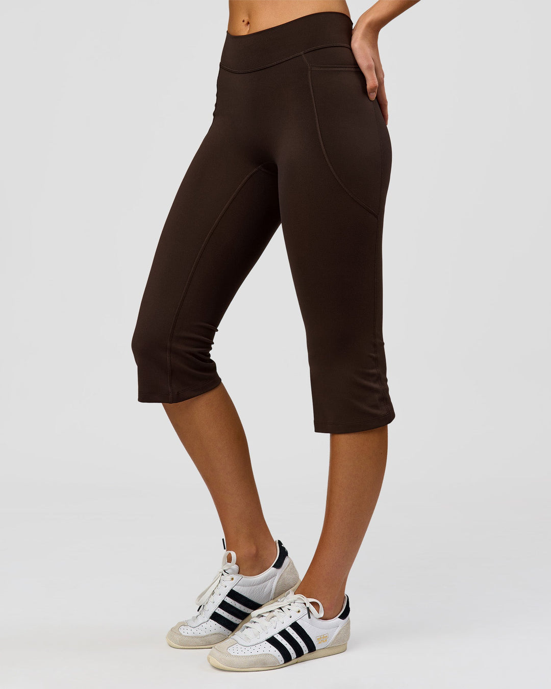 Woman wearing Deep V-Contour High-Rise Flared Capri - Ground Coffee | Model:Taneisha | Size:XS - view 3