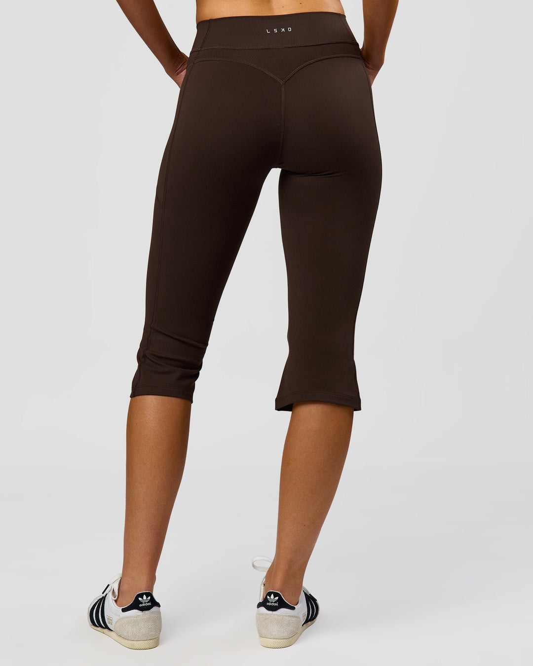 Woman wearing Deep V-Contour High-Rise Flared Capri - Ground Coffee | Model:Taneisha | Size:XS - view 8