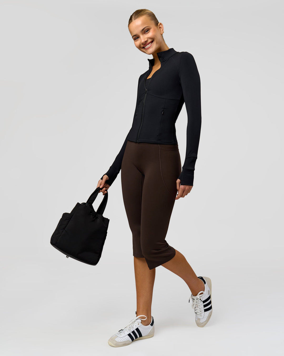 Woman wearing Deep V-Contour High-Rise Flared Capri - Ground Coffee | Model:Taneisha | Size:XS - view 14