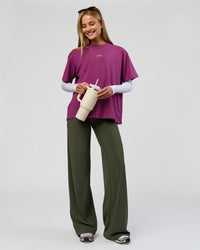 Woman wearing Elixir High-Rise Tall Pant - Pure Olive | Model:Taneisha | Size:XS | Thumbnail Index: 12