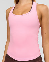 Woman wearing Flow Rib Scoop Neck Tank - Pink Rose | Model:Taneisha | Size:XS | Thumbnail Index: 1