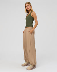 Woman wearing Flow Rib Scoop Neck Tank - Pure Olive | Model:Taneisha | Size:XS | Thumbnail Index: 3