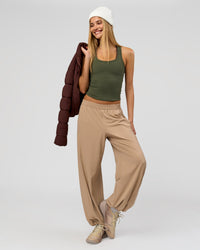 Woman wearing Flow Rib Scoop Neck Tank - Pure Olive | Model:Taneisha | Size:XS | Thumbnail Index: 4