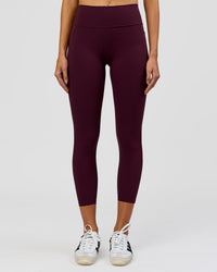 Woman wearing Fusion High-Rise 7/8 Legging Pockets - Cherry Lacquer | Model:Taneisha | Size:XS | Thumbnail Index: 2