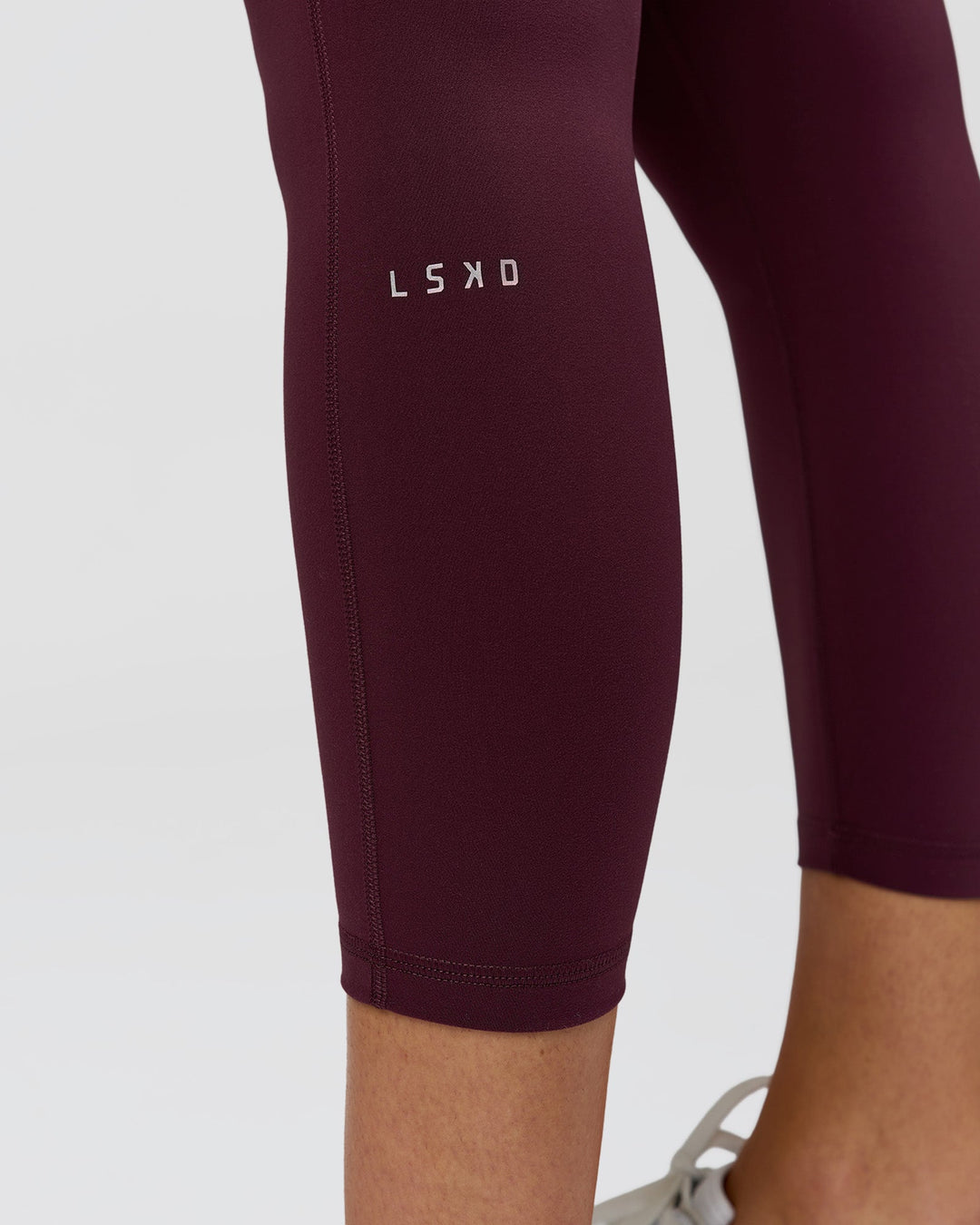 Woman wearing Fusion High-Rise 7/8 Legging Pockets - Cherry Lacquer | Model:Taneisha | Size:XS - view 6