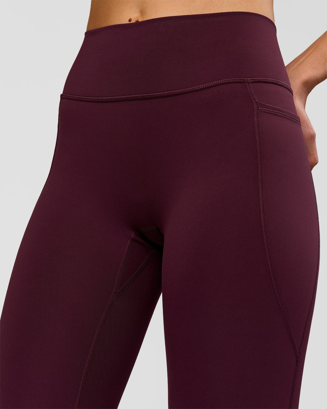 Woman wearing Fusion High-Rise Full Length Legging Pockets - Cherry Lacquer | Model:Taneisha | Size:XS - view 4