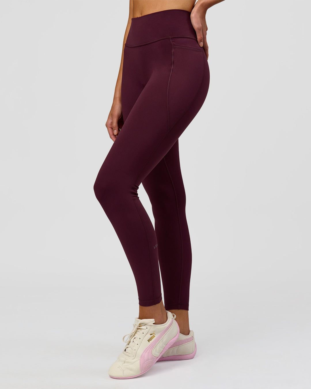 Woman wearing Fusion High-Rise Full Length Legging Pockets - Cherry Lacquer | Model:Taneisha | Size:XS - view 7
