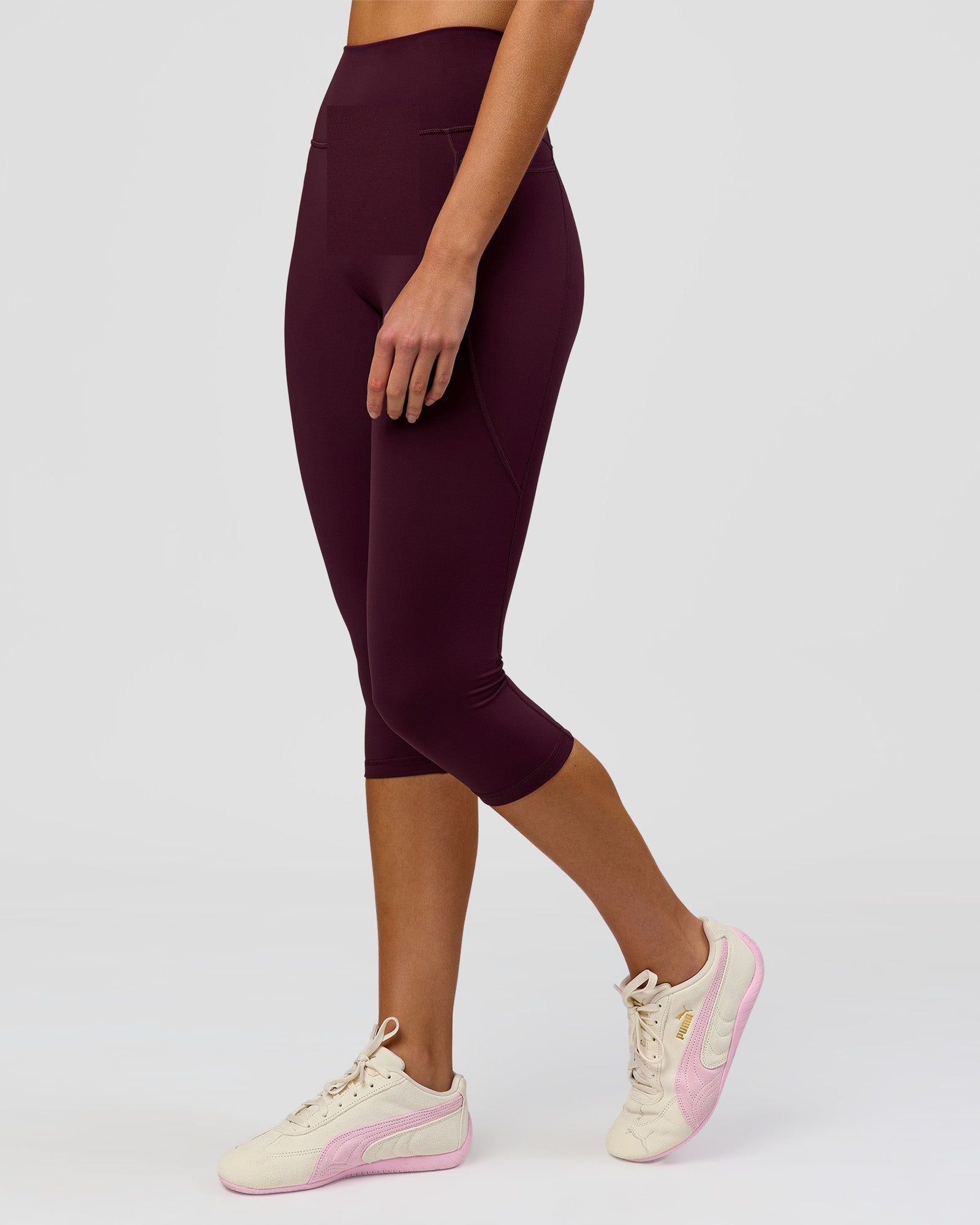 Woman wearing Fusion Ultra High-Rise 3/4 Legging Pockets - Cherry Lacquer | Model:Taneisha | Size:XS