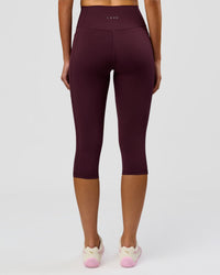 Woman wearing Fusion Ultra High-Rise 3/4 Legging Pockets - Cherry Lacquer | Model:Taneisha | Size:XS | Thumbnail Index: 5