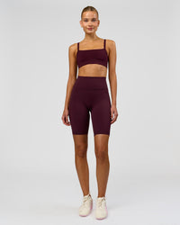 Woman wearing Fusion Ultra High-Rise 9" Short Pockets - Cherry Lacquer | Model:Taneisha | Size:XS | Thumbnail Index: 2