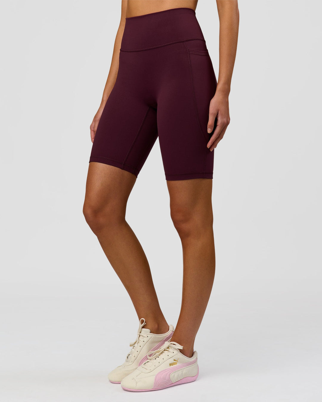 Woman wearing Fusion Ultra High-Rise 9" Short Pockets - Cherry Lacquer | Model:Taneisha | Size:XS - view 5