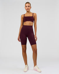 Woman wearing Fusion Ultra High-Rise 9" Short Pockets - Cherry Lacquer | Model:Taneisha | Size:XS | Thumbnail Index: 6
