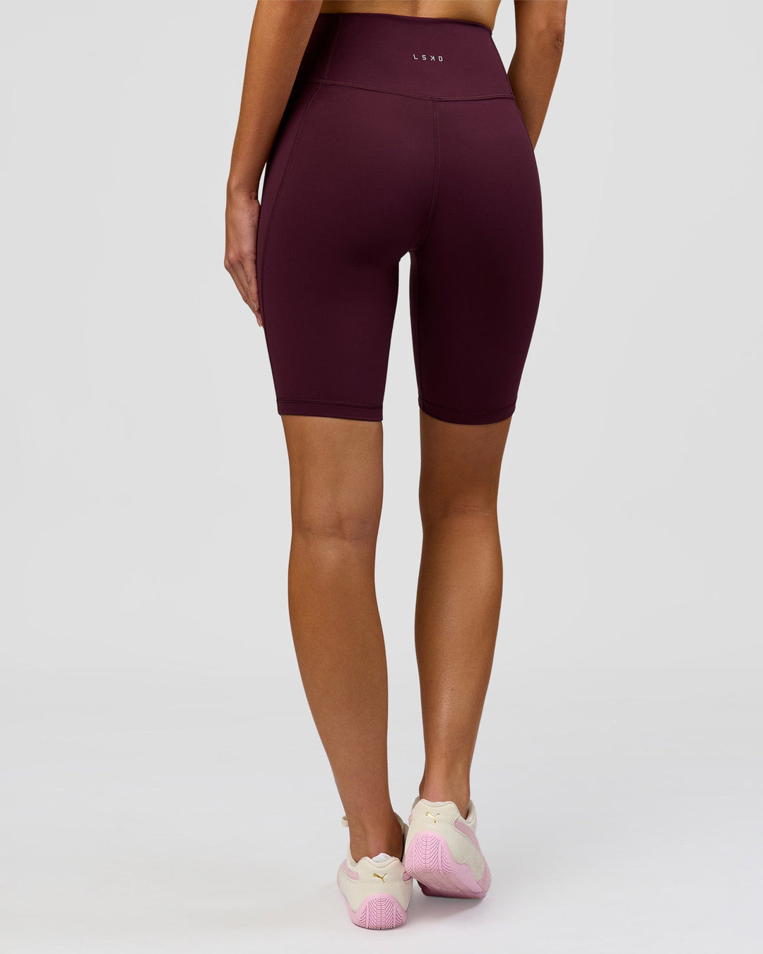 Woman wearing Fusion Ultra High-Rise 9" Short Pockets - Cherry Lacquer | Model:Taneisha | Size:XS - view 9