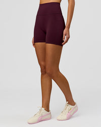 Woman wearing Fusion V-Contour Ultra High-Rise 4" Short Pockets - Cherry Lacquer | Model:Taneisha | Size:XS | Thumbnail Index: 7