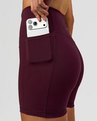 Woman wearing Fusion V-Contour Ultra High-Rise 4" Short Pockets - Cherry Lacquer | Model:Taneisha | Size:XS | Thumbnail Index: 8