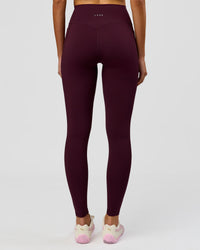 Woman wearing Fusion V-Contour Ultra High-Rise Full Length Legging Pockets - Cherry Lacquer | Model:Taneisha | Size:XS | Thumbnail Index: 0