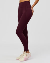 Woman wearing Fusion V-Contour Ultra High-Rise Full Length Legging Pockets - Cherry Lacquer | Model:Taneisha | Size:XS | Thumbnail Index: 4