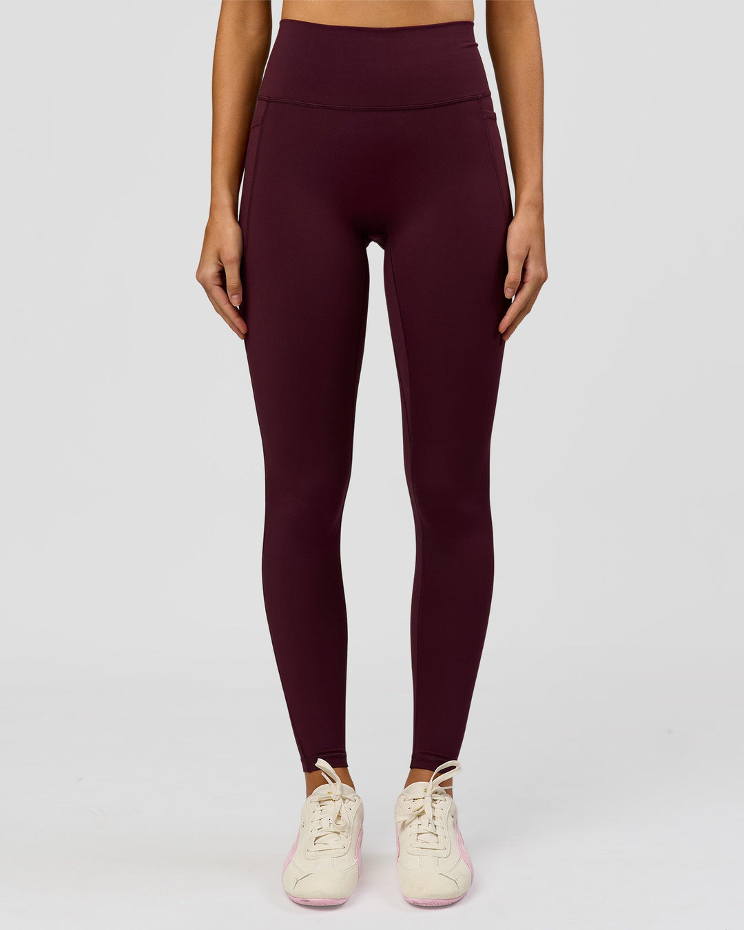 Woman wearing Fusion V-Contour Ultra High-Rise Full Length Legging Pockets - Cherry Lacquer | Model:Taneisha | Size:XS - view 2