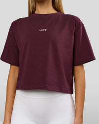 Woman wearing Go-To Heavyweight FlxCotton Skimmer Tee - Cherry Lacquer-White | Model:Taneisha | Size:XS | Thumbnail Index: 1