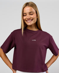 Woman wearing Go-To Heavyweight FlxCotton Skimmer Tee - Cherry Lacquer-White | Model:Taneisha | Size:XS | Thumbnail Index: 3