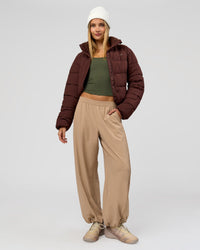 Woman wearing Go-To Puffer Jacket - Hot Chocolate | Model:Taneisha | Size:XS | Thumbnail Index: 4