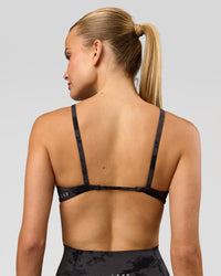 Woman wearing Minimal Sports Bra - Black Tie Dye | Model:Taneisha | Size:XS | Thumbnail Index: 1