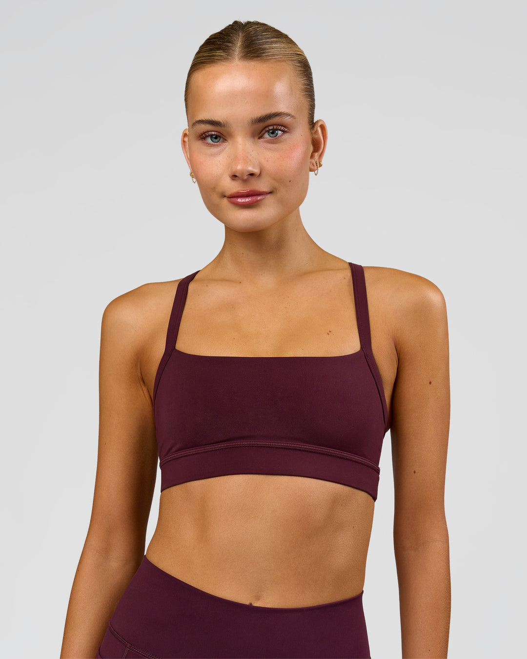Woman wearing Momentum Sports Bra - Cherry Lacquer | Model:Taneisha | Size:XS - view 5