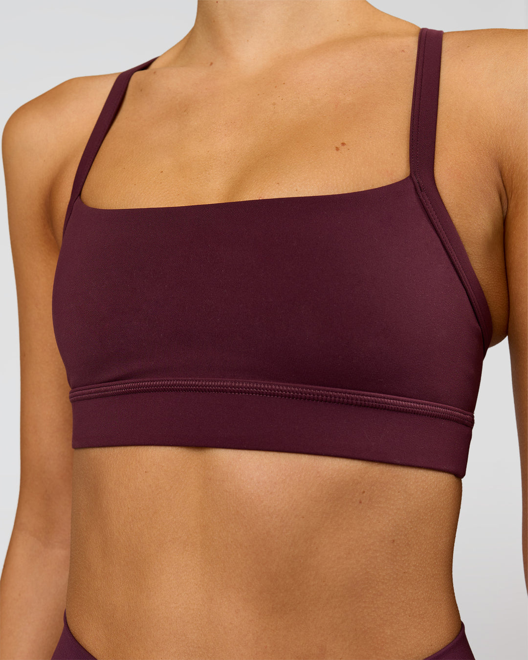 Woman wearing Momentum Sports Bra - Cherry Lacquer | Model:Taneisha | Size:XS - view 6