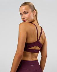 Woman wearing Momentum Sports Bra - Cherry Lacquer | Model:Taneisha | Size:XS | Thumbnail Index: 8