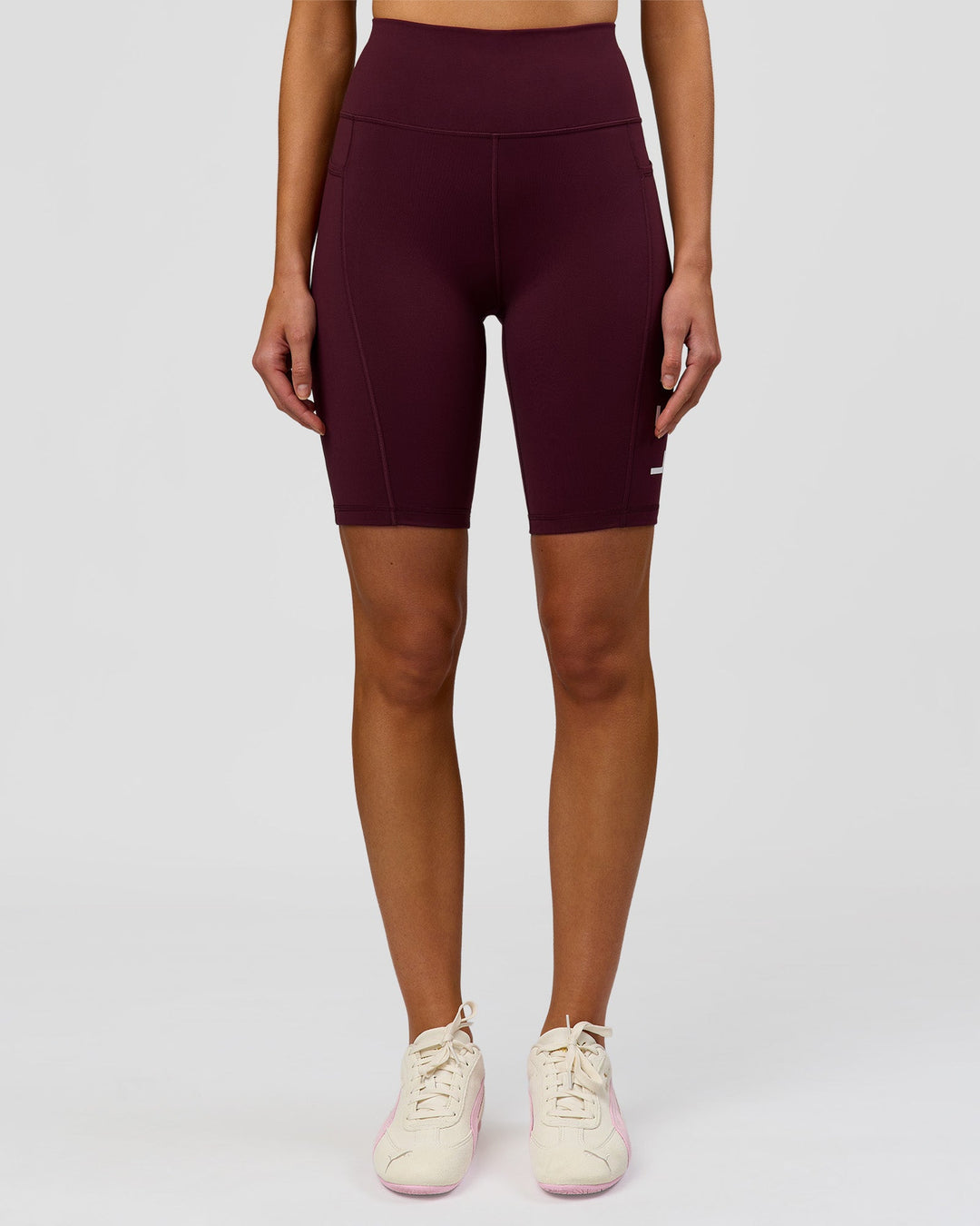 Woman wearing Rep Ultra High-Rise 9" Short Pockets - Cherry Lacquer-White | Model:Taneisha | Size:XS - view 4