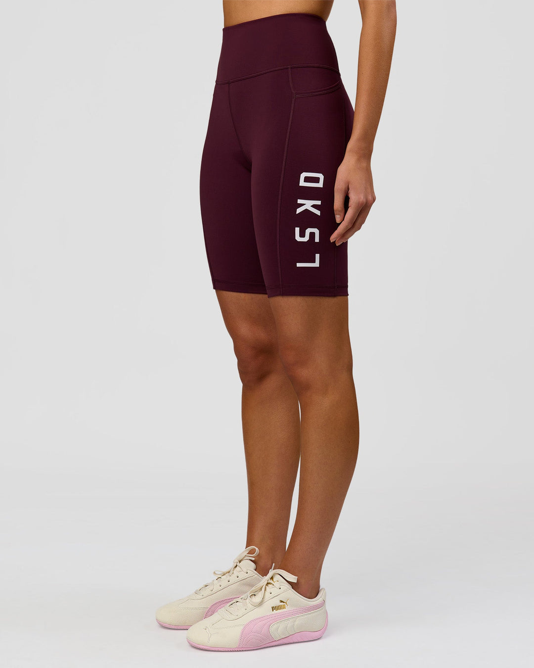 Woman wearing Rep Ultra High-Rise 9" Short Pockets - Cherry Lacquer-White | Model:Taneisha | Size:XS - view 5