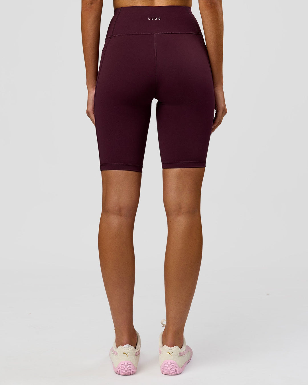 Woman wearing Rep Ultra High-Rise 9" Short Pockets - Cherry Lacquer-White | Model:Taneisha | Size:XS - view 8