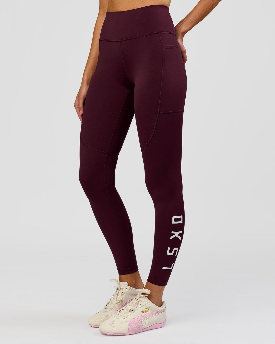 Woman wearing Rep Ultra High-Rise Full Length Legging Pockets - Cherry Lacquer-White | Model:Taneisha | Size:XS - view 4