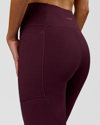 Woman wearing Rep Ultra High-Rise Full Length Legging Pockets - Cherry Lacquer-White | Model:Taneisha | Size:XS | Thumbnail Index: 6