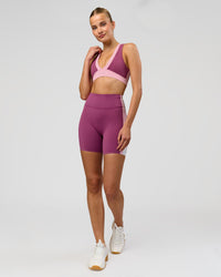 Woman wearing Revitalise Ultra High-Rise 6" Short - Boysenberry-Pink Rose | Model:Taneisha | Size:XS | Thumbnail Index: 4
