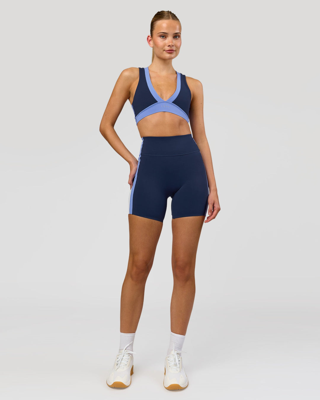 Woman wearing Stamina Layered Sports Bra - Future Navy-Bluebell | Model:Taneisha | Size:XS - view 5