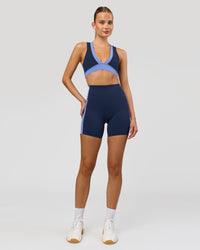 Woman wearing Stamina Layered Sports Bra - Future Navy-Bluebell | Model:Taneisha | Size:XS | Thumbnail Index: 4
