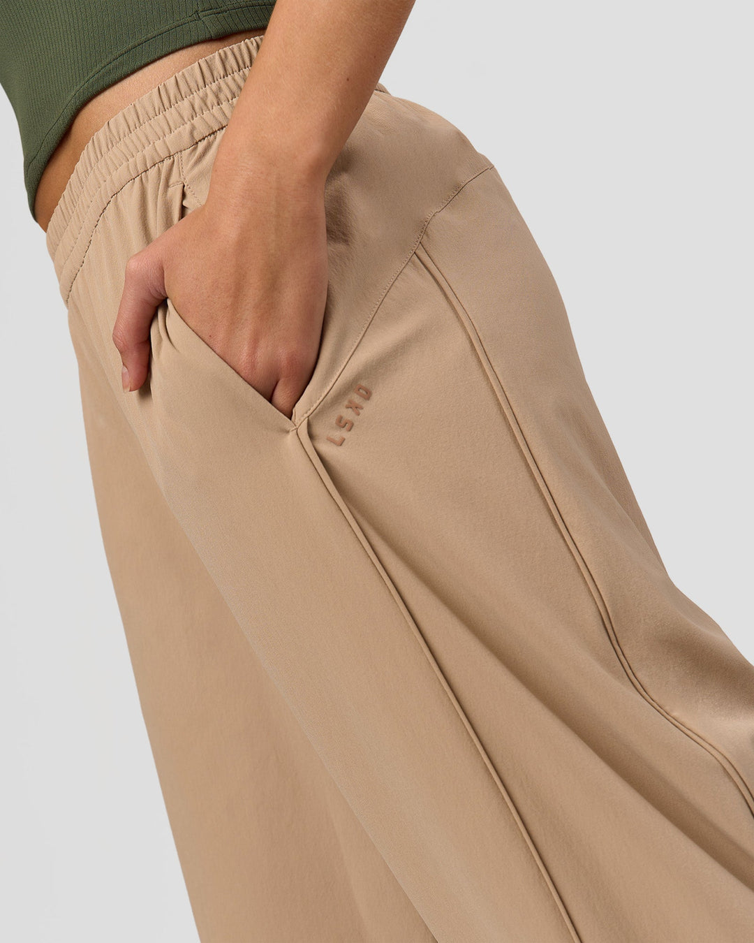Woman wearing Stitch Up Track Pant - Warm Smoke | Model:Taneisha | Size:XS - view 2