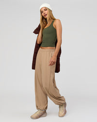 Woman wearing Stitch Up Track Pant - Warm Smoke | Model:Taneisha | Size:XS | Thumbnail Index: 6